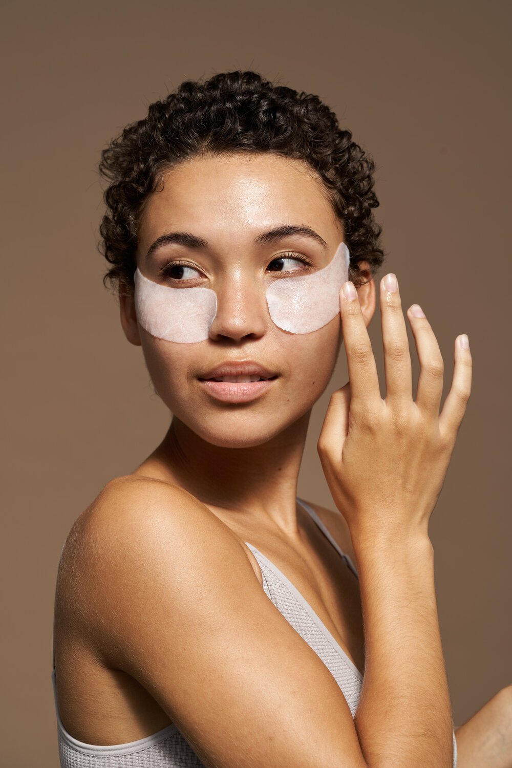 African American Woman With Cosmetic Patches On Face