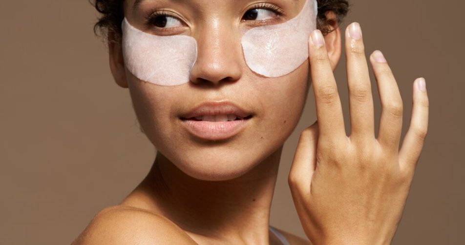 African American Woman With Cosmetic Patches On Face